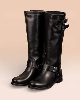 Benheart Maria 994 women's black leather boots with buckles and harness strap, front angled view.