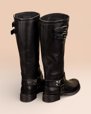 Benheart Maria 994 women's black leather boots with buckles and harness strap, rear view.