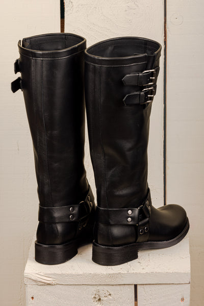 Benheart Maria 994 women's black leather boots with buckles and harness strap, rear view.