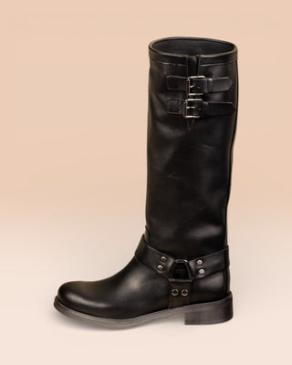 Benheart Maria 994 women's black leather boots with buckles and harness strap, side view.