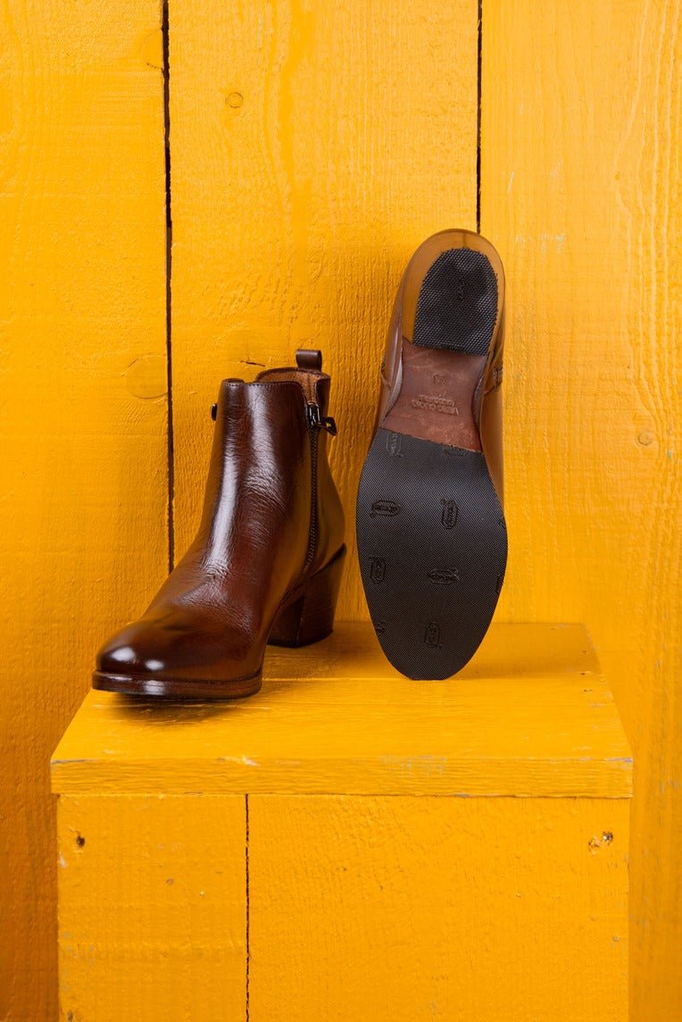 Benheart Miranda 5258 women’s brandy leather ankle boots with side zip, one boot front angled view and the other showing the sole