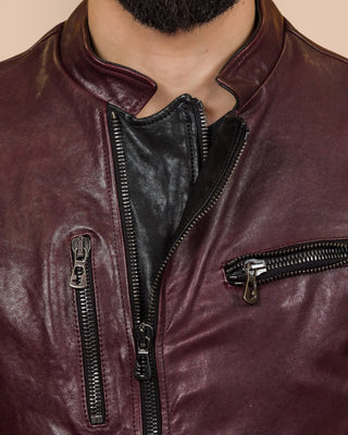 Close-up detail of the NELSON Limited Edition leather jacket in plum color by Benheart, highlighting the zippers