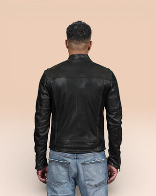 Model shown from the back wearing the black Nelson leather jacket by Benheart, handcrafted in Italy.