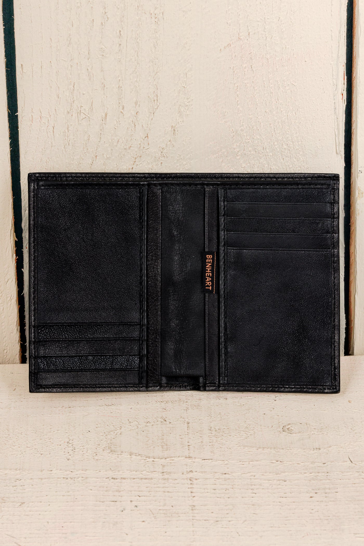 Interior view of open black New York wallet by Benheart.