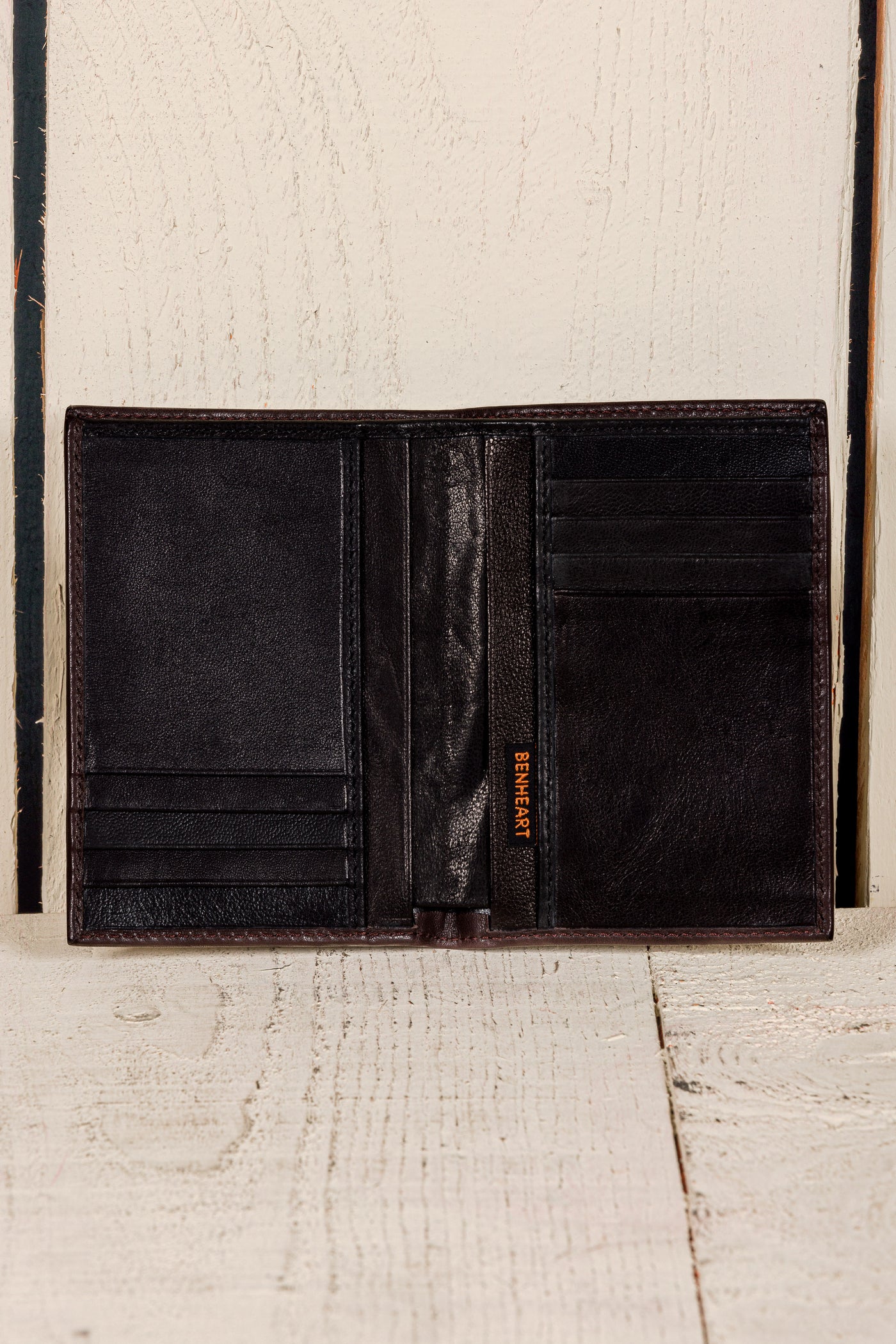 Open dark brown testa di moro New York wallet by Benheart, made in Italy from genuine leather.