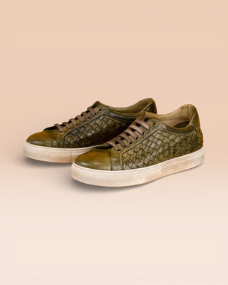 Front angled view of Oliviero 6201 men's woven low top sneakers in kaki with white soles.