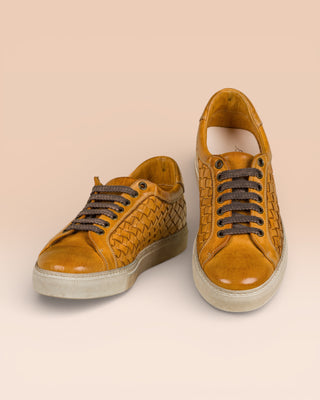 Front angled and top view of the Oliviero 6201 mahogany woven leather sneakers by Benheart.