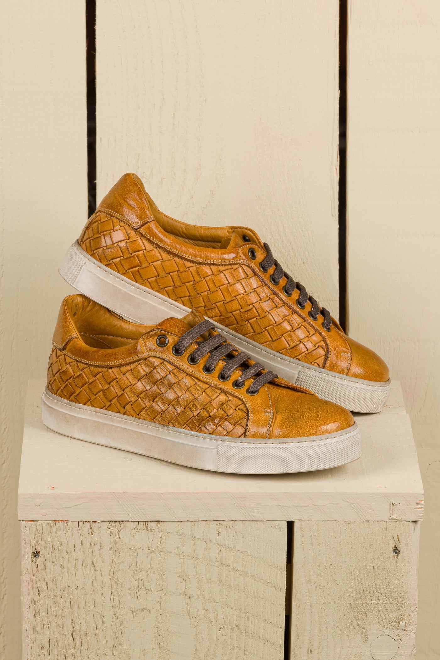 Oliviero 6201 men's mahogany woven leather low-top sneakers, side view showing both shoes.