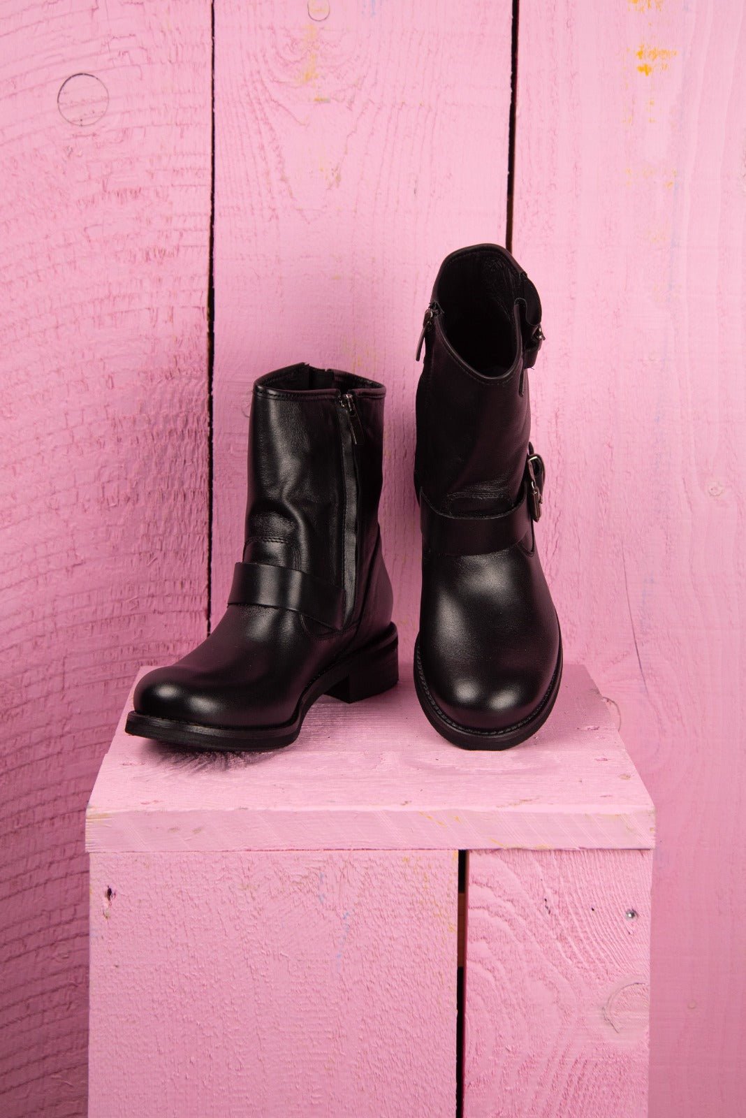 Benheart PRE08F women’s black leather ankle boots with buckles and side zip, front angled and top view.