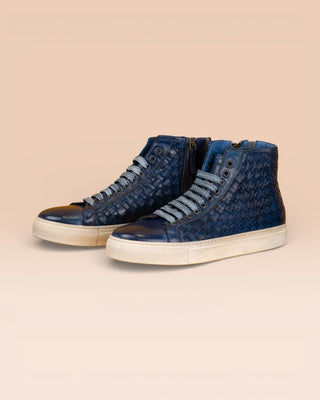 Front angled view of Raimondo 8393 unisex indigo woven high-top sneakers with rubber soles.