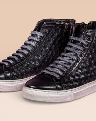 Close up view of Raimondo 8393 unisex black woven high-top sneakers with rubber soles.