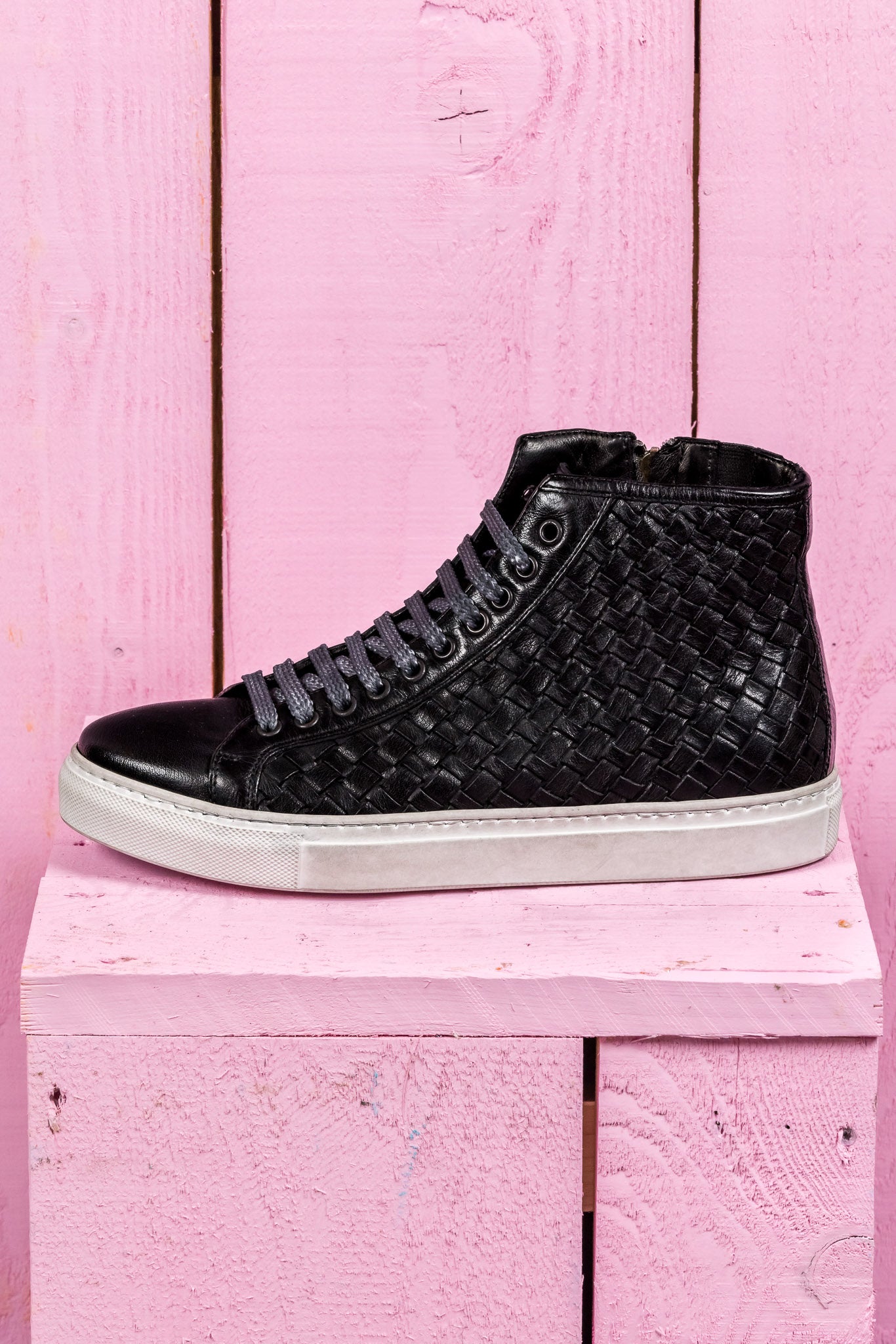 Side view of Raimondo 8393 unisex black woven leather high-top sneakers.