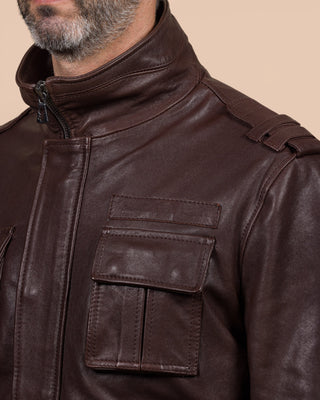 Close-up of the left shoulder and chest pocket of the Simone jacket by Benheart, handcrafted in Italy from garment-dyed brown