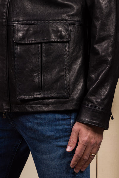 Close-up of the lower left front pocket of the Simone jacket by Benheart, handmade in Florence, Italy, in black.