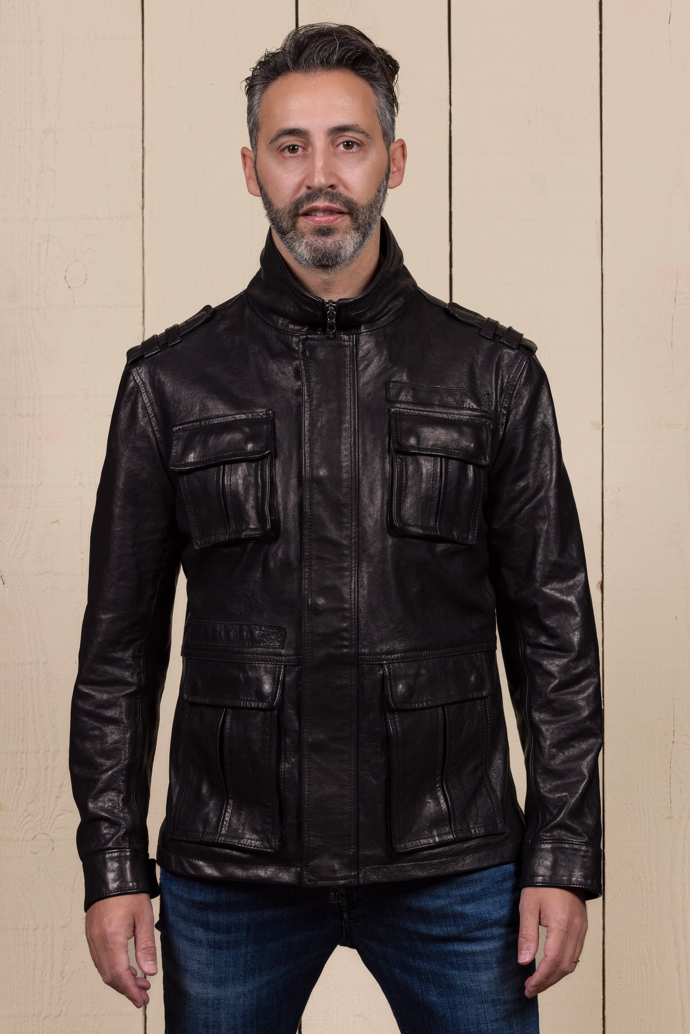 Front view of a model wearing the black Simone leather jacket by Benheart.