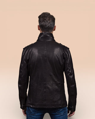 Back view of a model wearing the black Simone leather jacket by Benheart.
