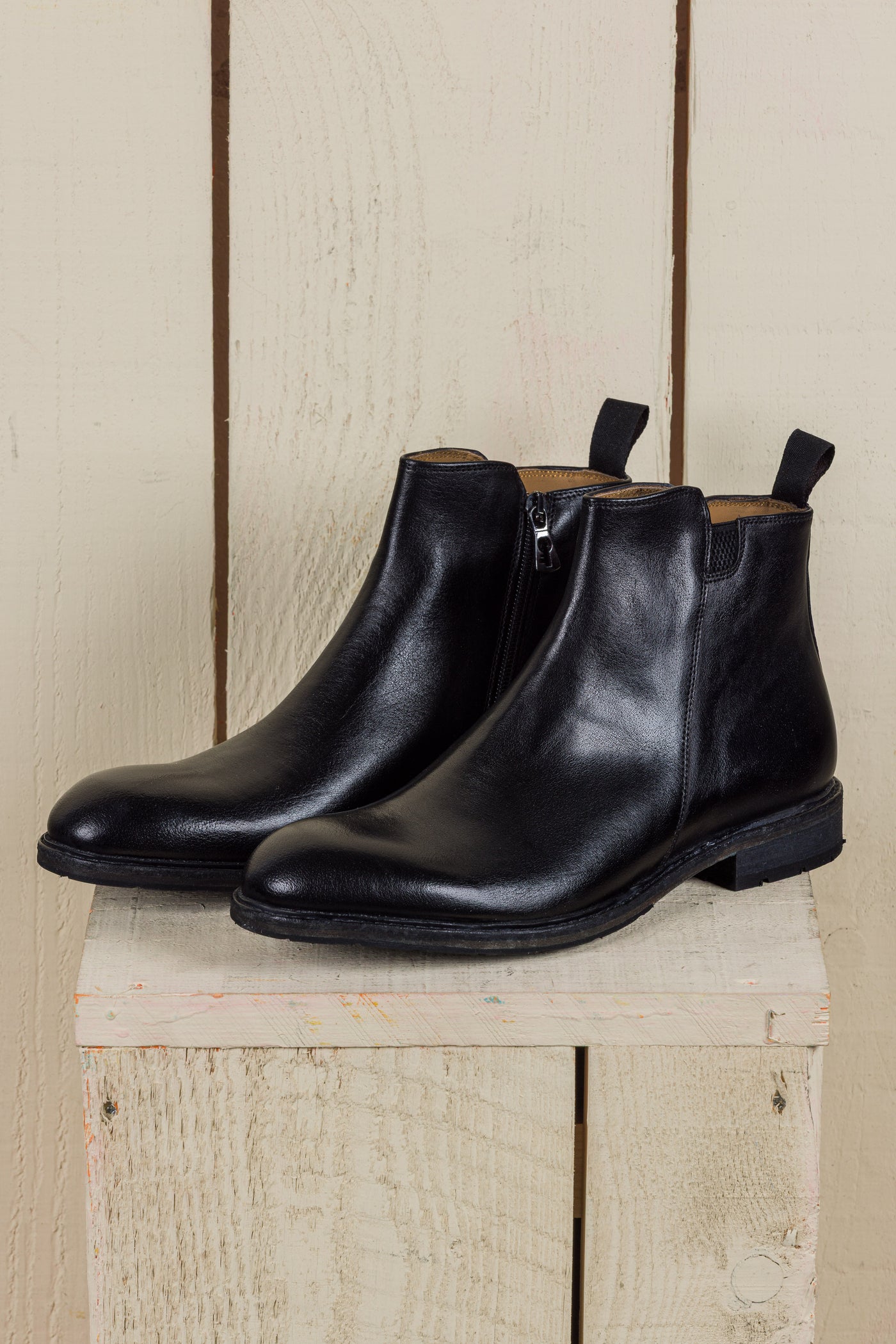 Front angled view of Benheart Suso men’s Chelsea boots in black leather with side zippers.