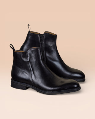 Side view of Suso black leather Chelsea boots by Benheart.