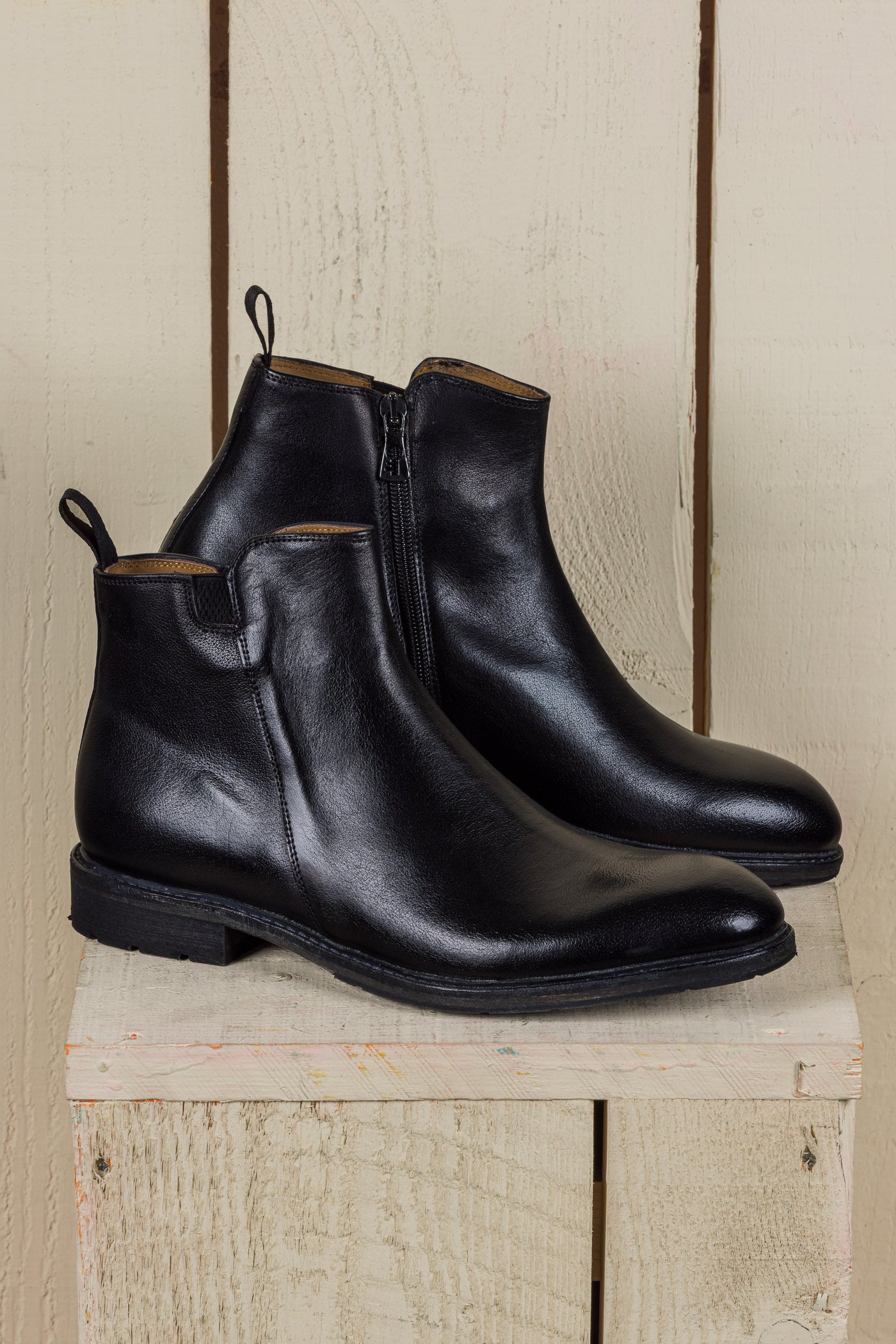 Side view of Suso black leather Chelsea boots by Benheart.