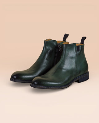 Front angled view of Benheart Suso men’s Chelsea boots in green leather with side zippers.