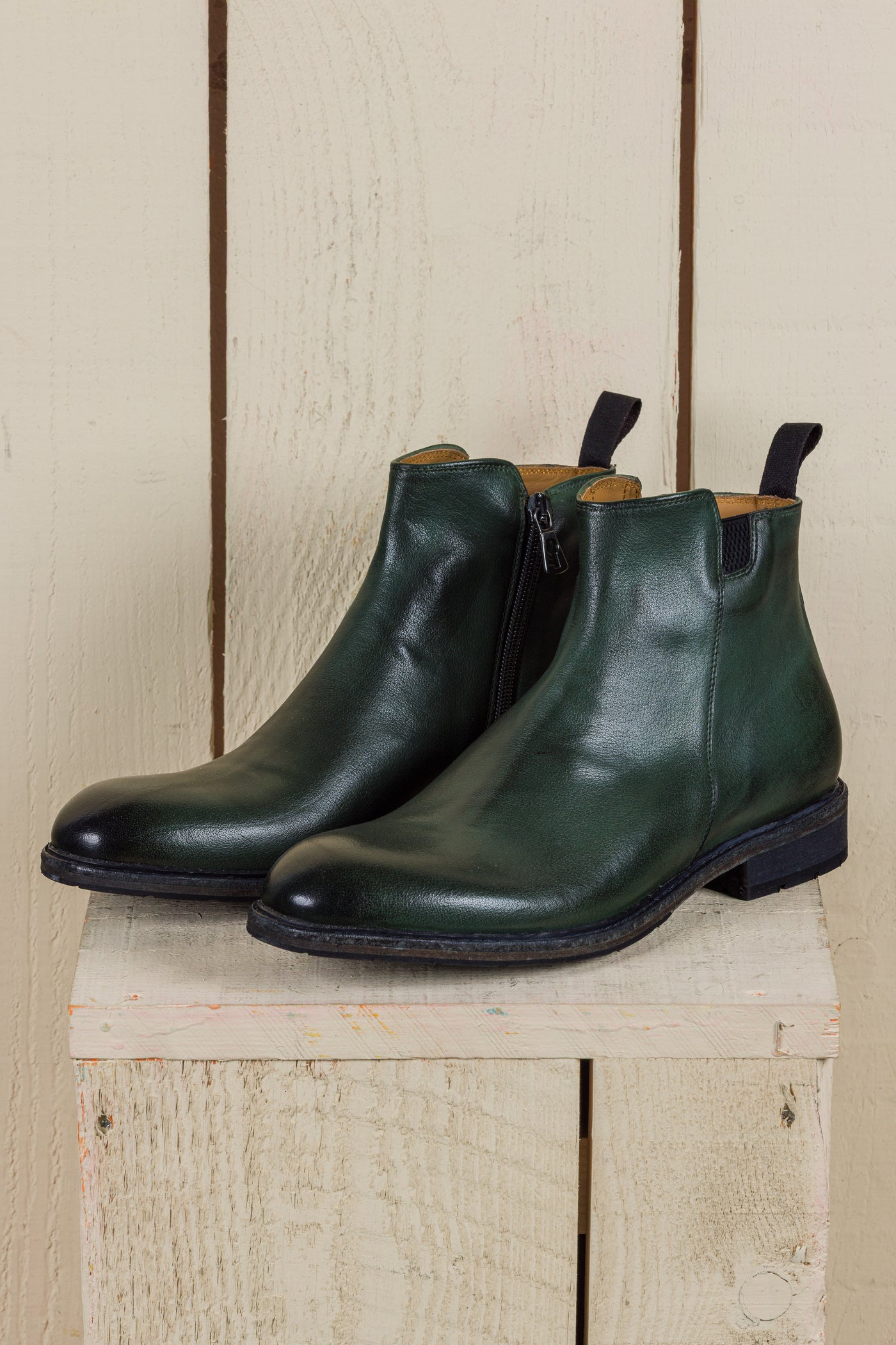 Front angled view of Benheart Suso men’s Chelsea boots in green leather with side zippers.