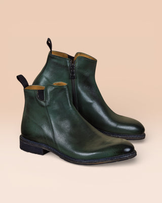 Side view of Suso green leather Chelsea boots by Benheart.