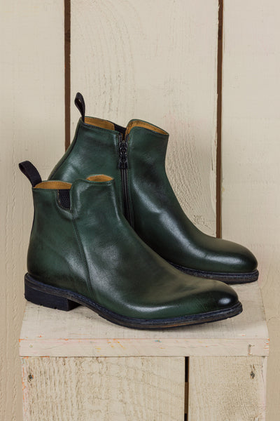 Side view of Suso green leather Chelsea boots by Benheart.