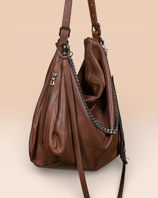 Side angled view and zip detail of VENICE model by Benheart in brown leather