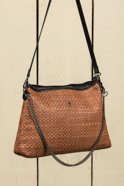Benheart Violet Intrecciata leather brown handwoven leather bag, three-quarter rear view, woven leather pattern, chain and leather shoulder strap, zipper closure, luxury designer handbag for women.