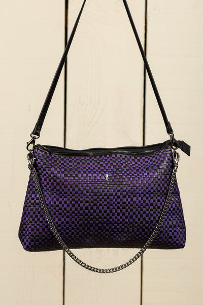 Front view of the Benheart Violet Intrecciata handwoven leather bag in black and violet, featuring a woven pattern, chain and leather shoulder strap, zipper closure.