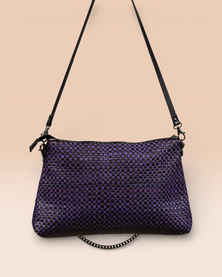 Benheart Violet Intrecciata black and violet handwoven leather bag, front view of the back, showing woven leather pattern, chain and leather shoulder strap, and zipper closure, luxury designer handbag for women.
