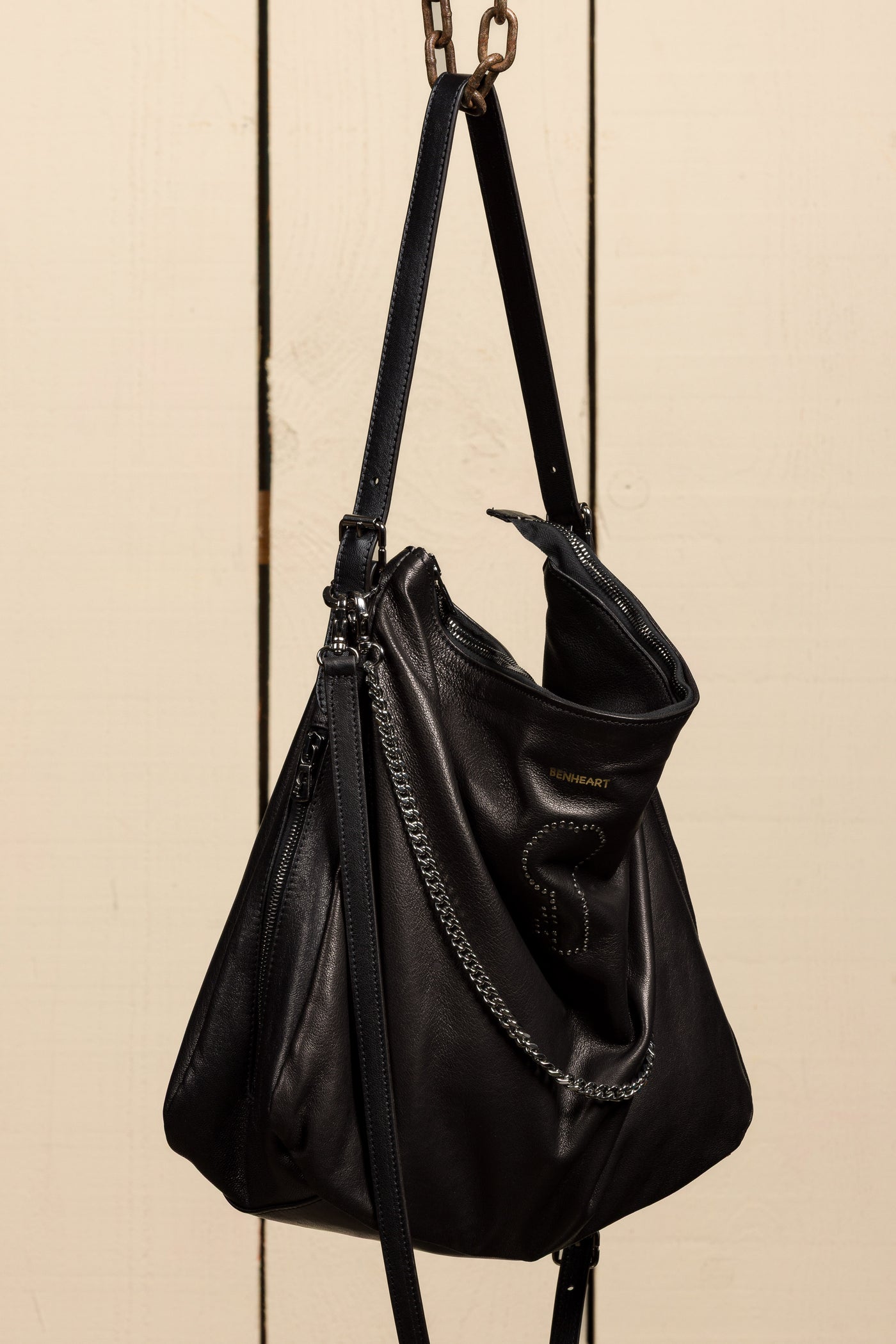 Front angled view of Venice Logo black leather bag by Benheart, handcrafted in Florence, Italy.