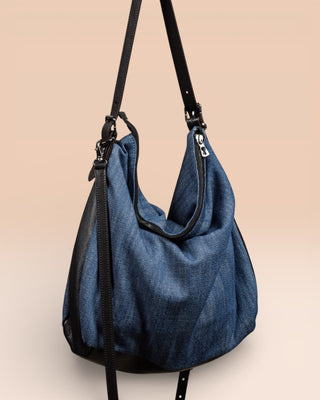 Rear view of Venice Jeans denim and leather bag.