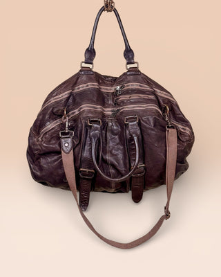 Angled front and top view of the Benheart Viaggio unisex brown leather travel bag, showing multiple zippers, handles
