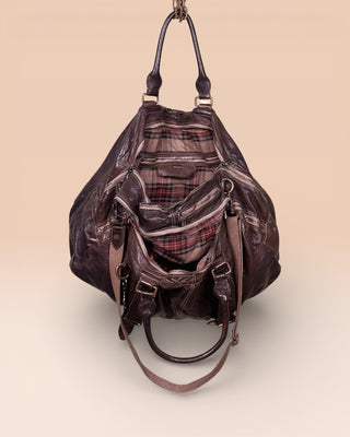 Open view of the Benheart Viaggio unisex brown leather travel bag, showing plaid fabric lining and internal compartments.