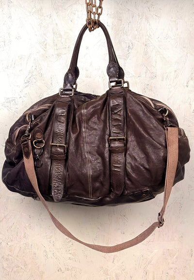 Side profile view of the Benheart Viaggio unisex brown leather travel bag.
