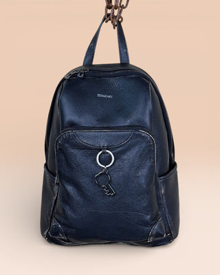 Benheart Zoe Special women’s black and beige leather backpack, front view with front pockets and Benheart logo-shaped key