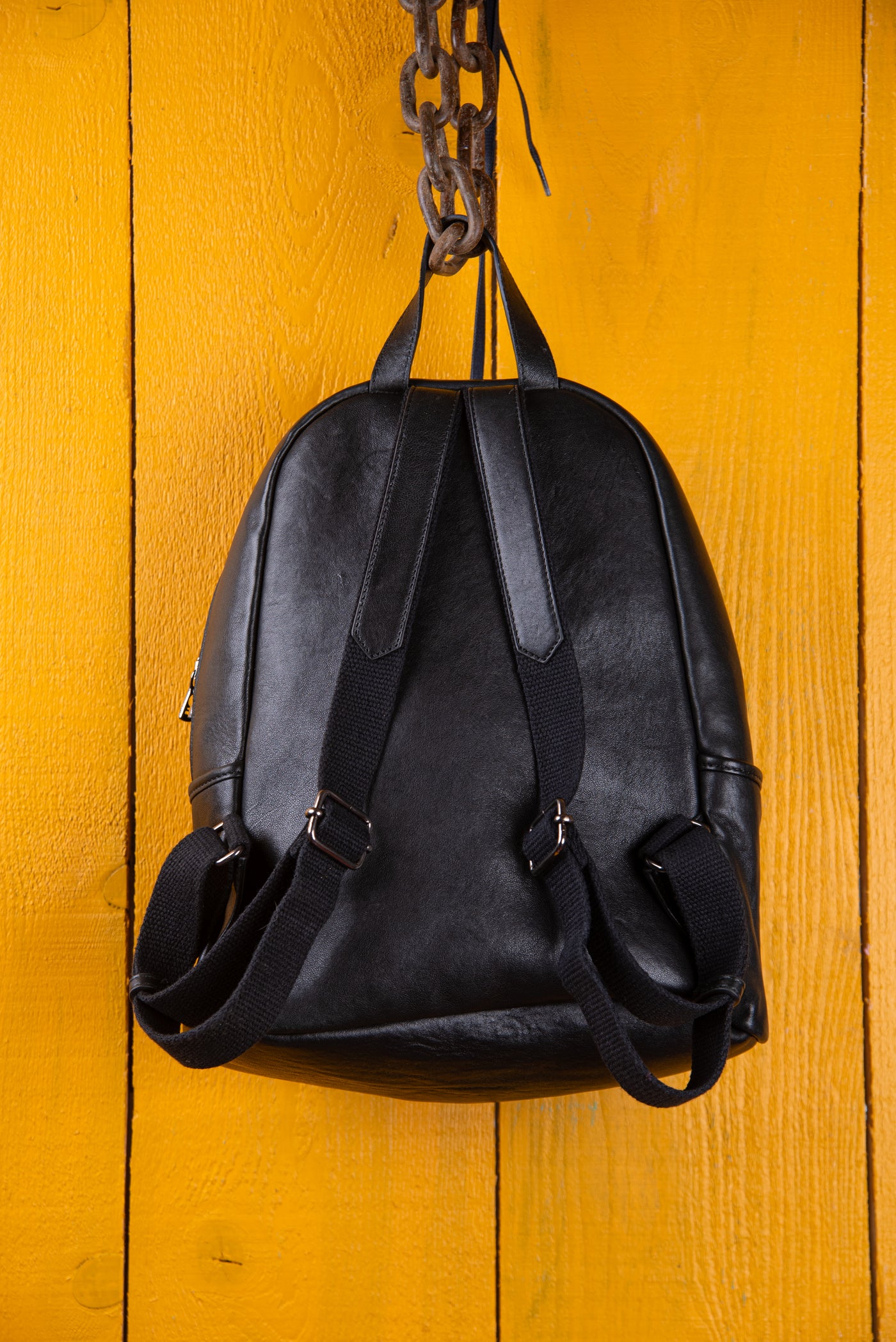 Zoe women’s backpack with black and red weave by Benheart, back view.