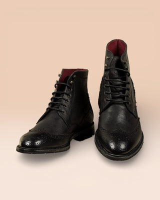 Front and top angled view of Daniel men's leather boots in black, handmade in Florence, Italy.