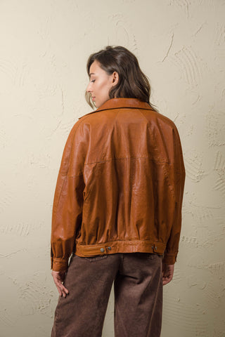 Back of the Jasmine women’s oversized brown leather jacket with yoke seam and adjustable side tabs
