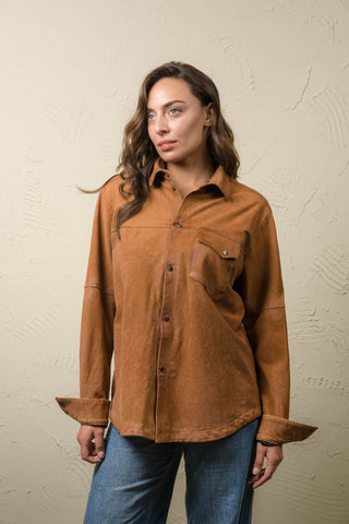 Steve women’s oversized tan nubuck leather shirt jacket, front view closed with snap buttons and chest pocket