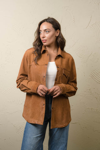 Steve tan nubuck leather shirt jacket worn open over a white top with jeans