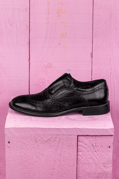 Side view of Benheart Colombo 7543 men’s black leather slip-on brogue shoes.