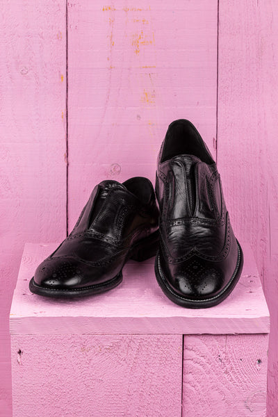 Front angled and top view of Benheart Colombo 7543 men’s black leather brogue slip-on shoes.