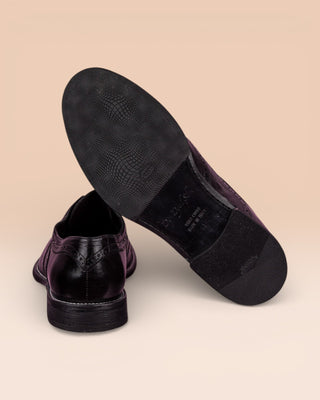 Rear view of Benheart Colombo 7543 men’s black leather brogue slip-on shoes with Vibram rubber sole detail.