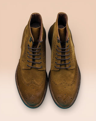 Top view of Benheart Daniel men’s lace-up brogue ankle boots with wingtip design in cognac suede.