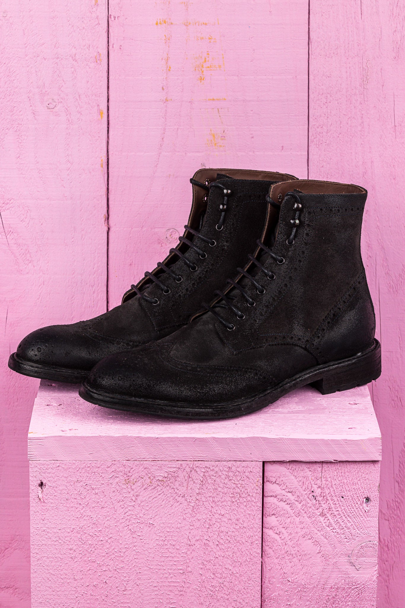 Front angled view of Benheart's Daniel men's suede leather lace-up brogue ankle boots with wingtip design in smoke grey.
