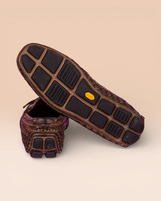 Rear view of Benheart Innocenti E951 woven moor leather driving moccasins, one showing the heel and the other the Vibram rubber sole.