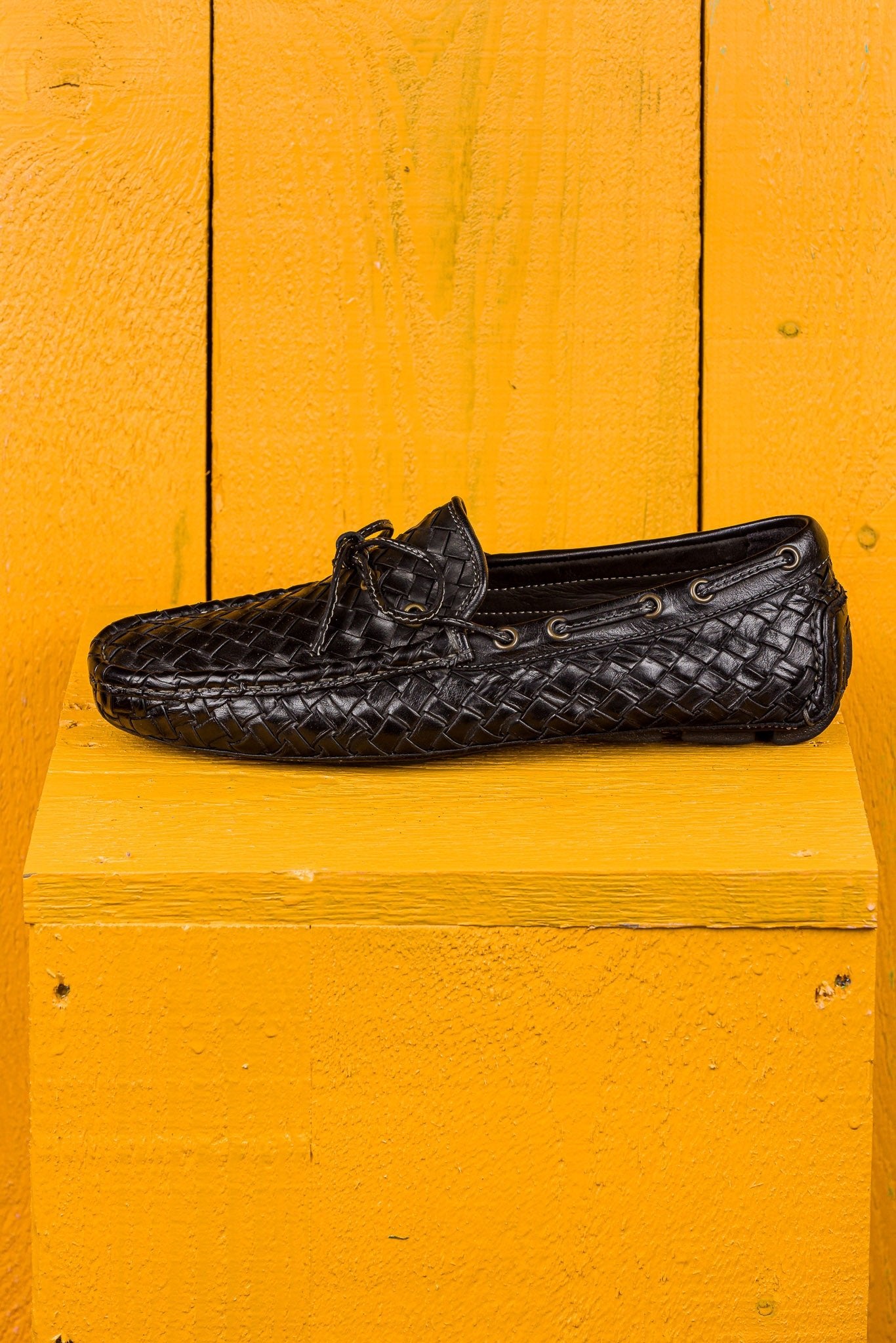 Side view of Benheart Innocenti E951 woven black leather driving moccasins.
