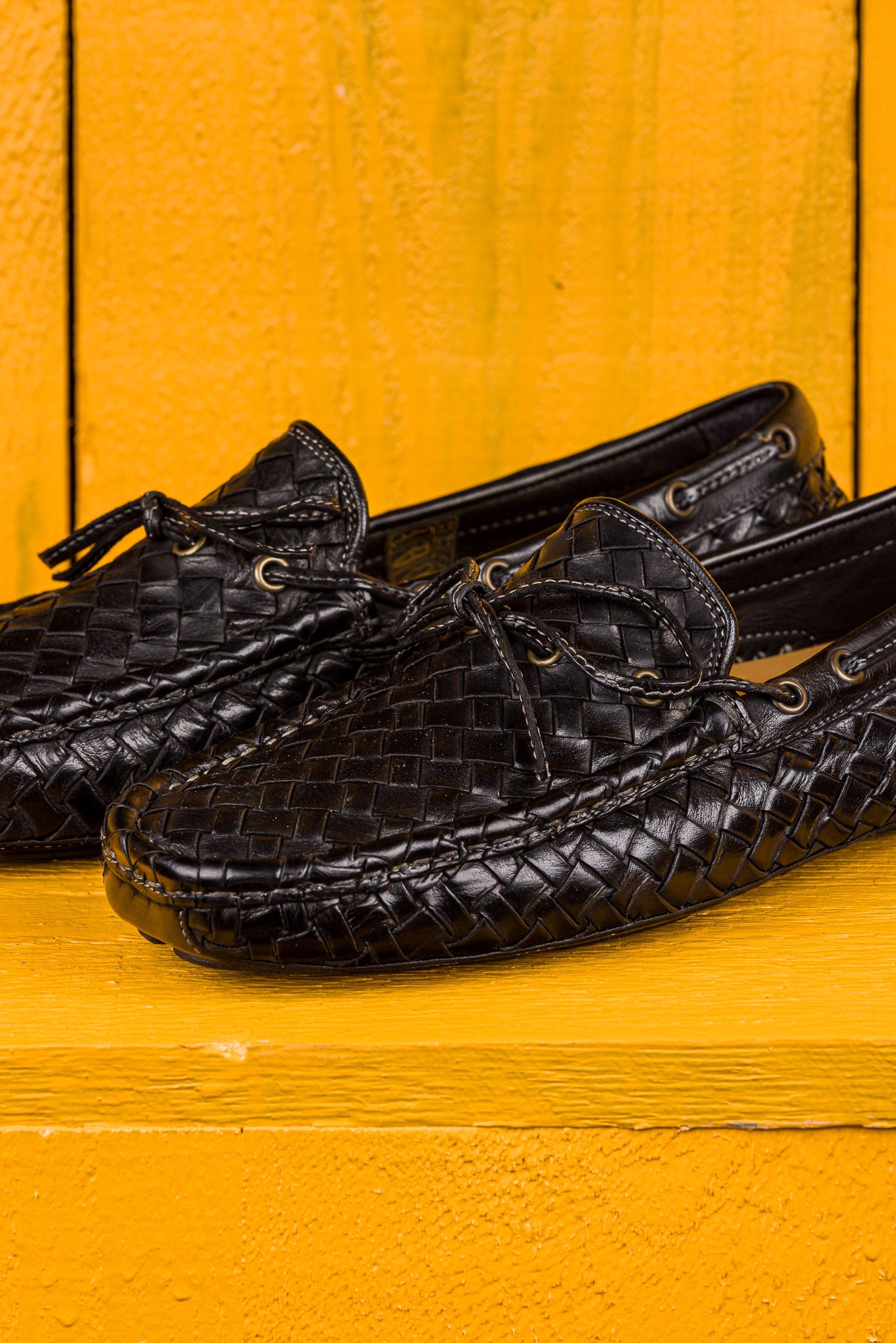 Close up view of Benheart Innocenti E951 woven black leather driving moccasins.